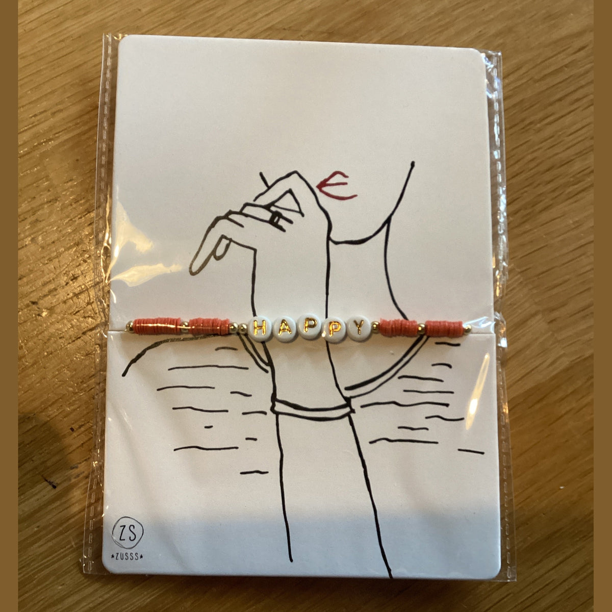 Zusss kralenarmband met tekst happy