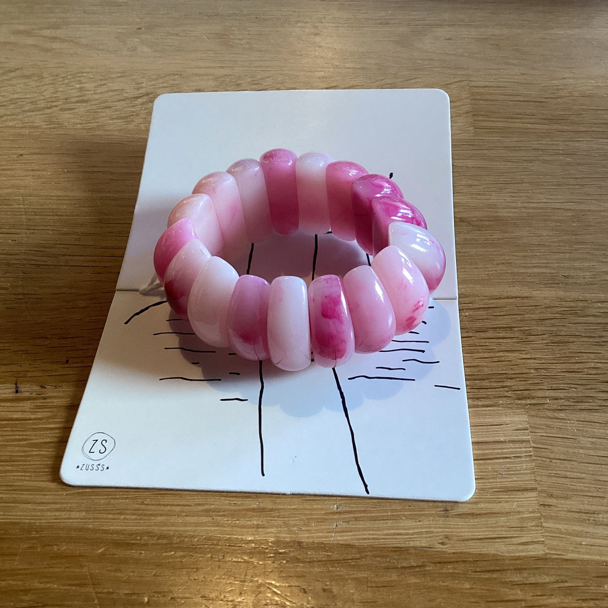 Zusss brede armband gevlamd fel roze
