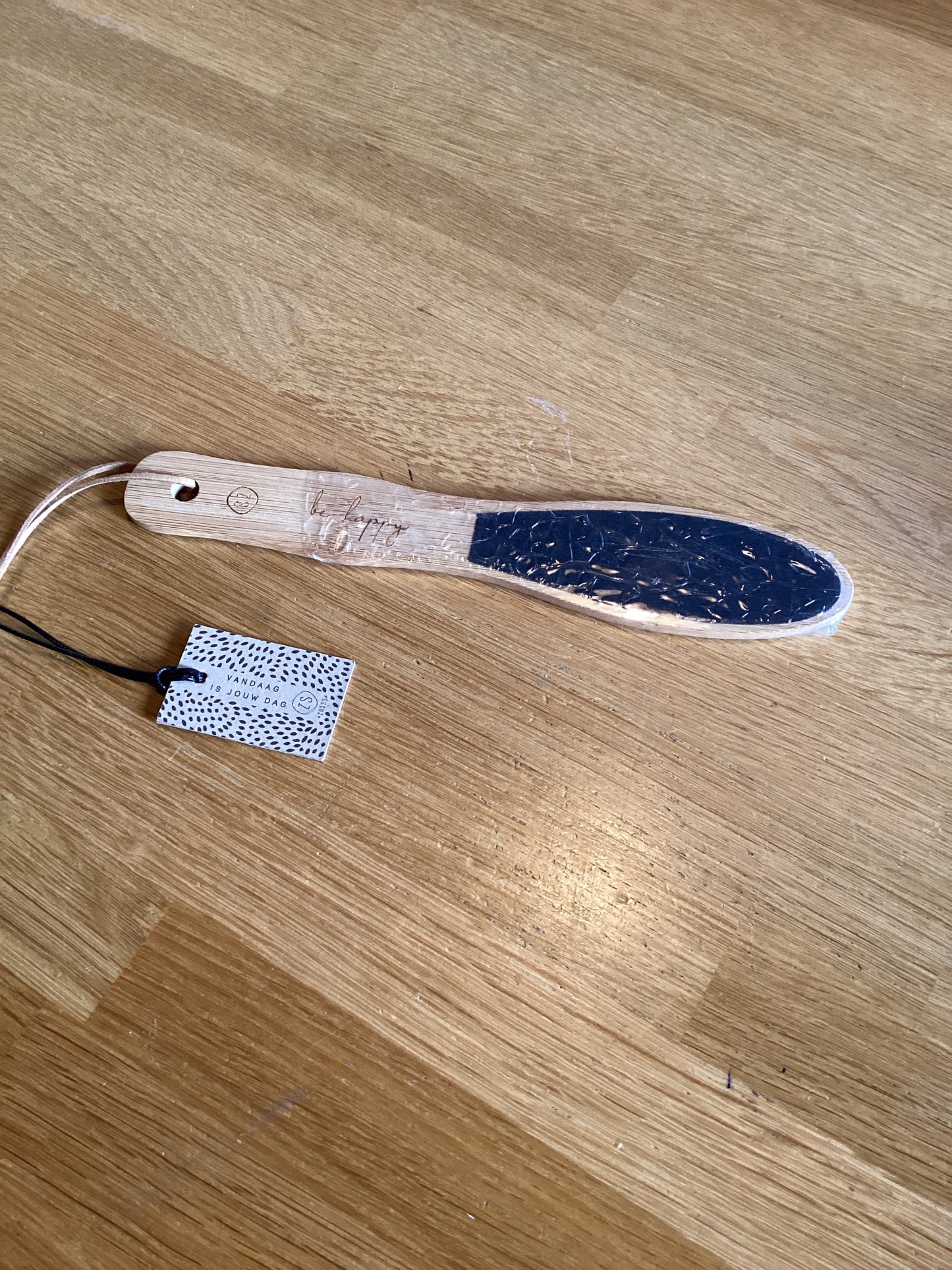 houten voetenvijl be happy