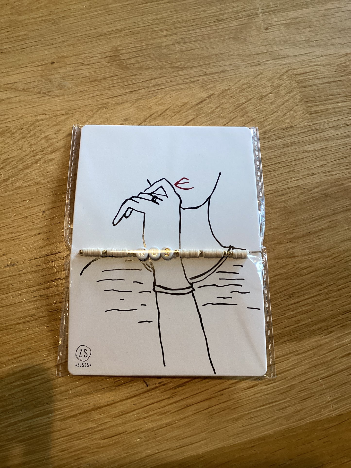 Zusss kralenarmband met tekst kus