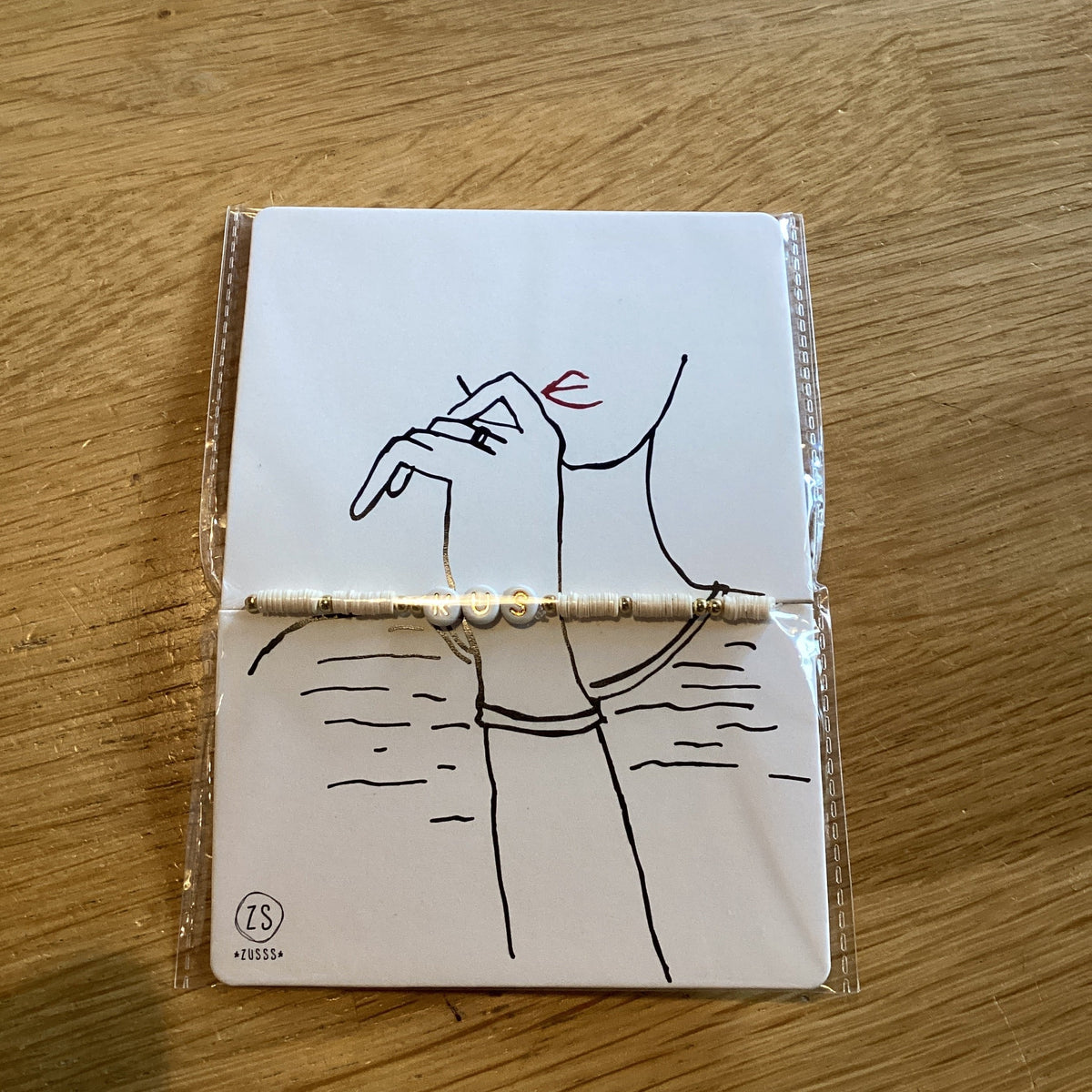 Zusss kralenarmband met tekst kus