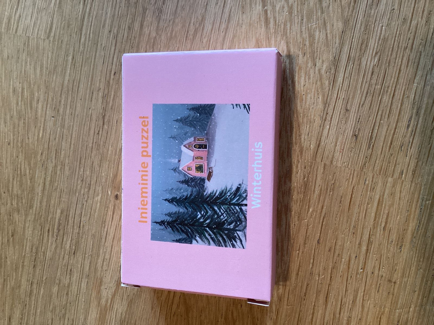Streken van Agnes mini puzzel winterhuis