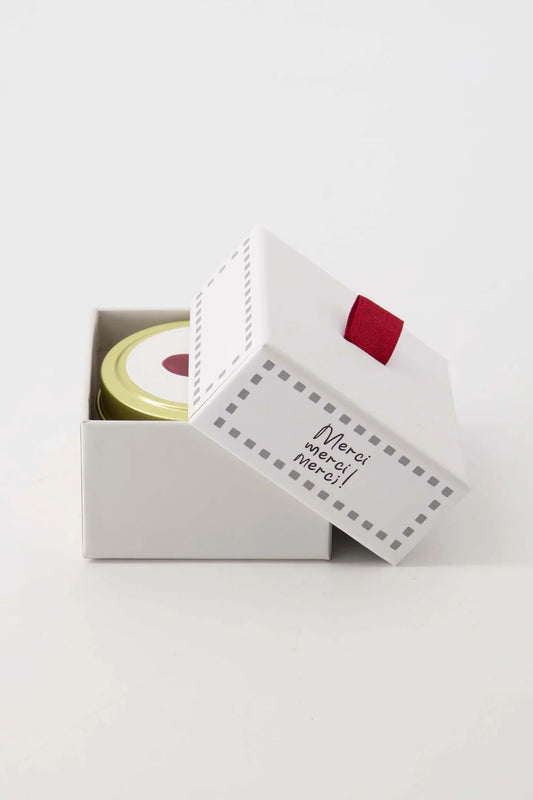 Geurkaarsje tinnen in doosje merci wit/grijsblauw