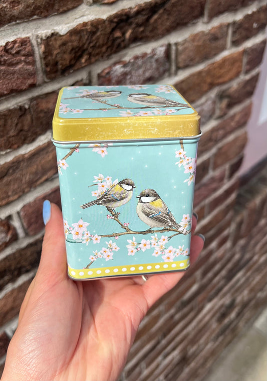 Thee blikje 2 vogels
